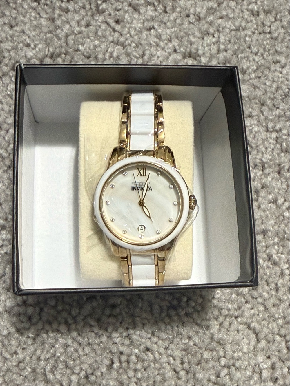 Invicta Women’s White and Gold Tone Ceramic Bracelet Watch